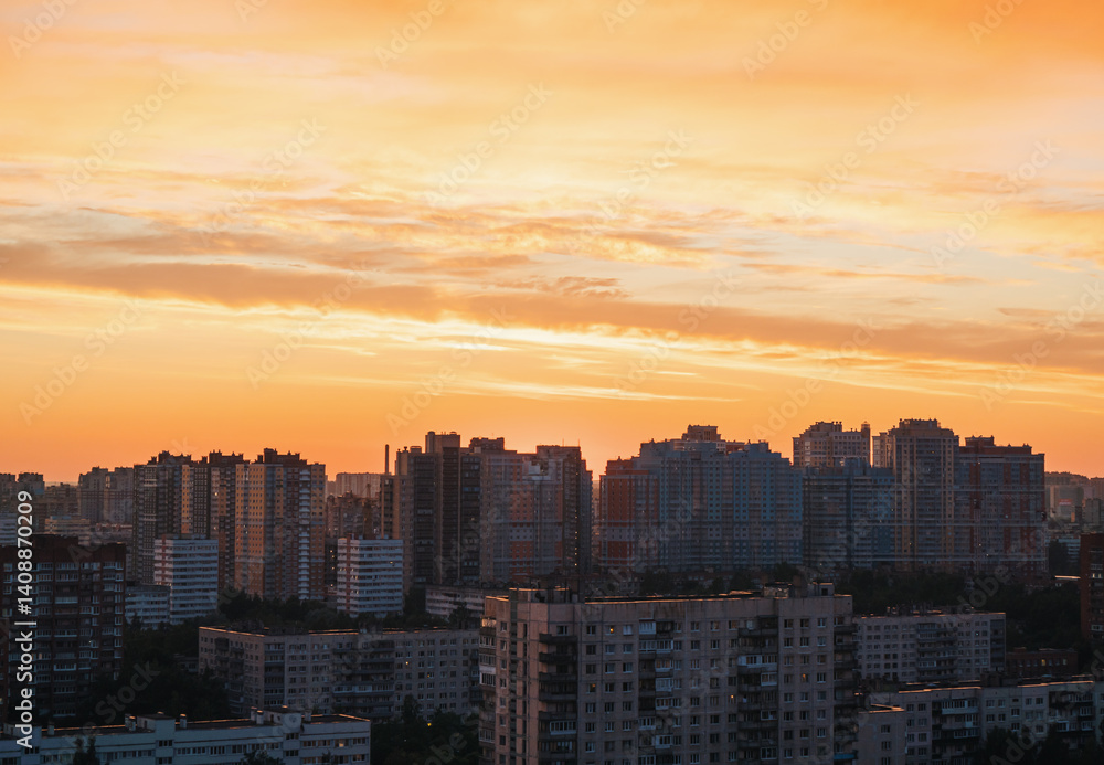 Vibrant city skyline during sunset with colorful clouds reflecting over urban buildings Vibrant city skyline during sunset with colorful clouds reflecting over urban buildings