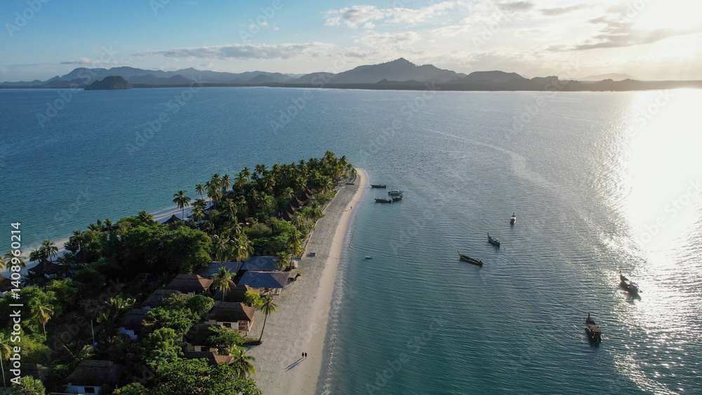 Aerial view of Andaman sea and long tail boat in Koh Mook, Thailand