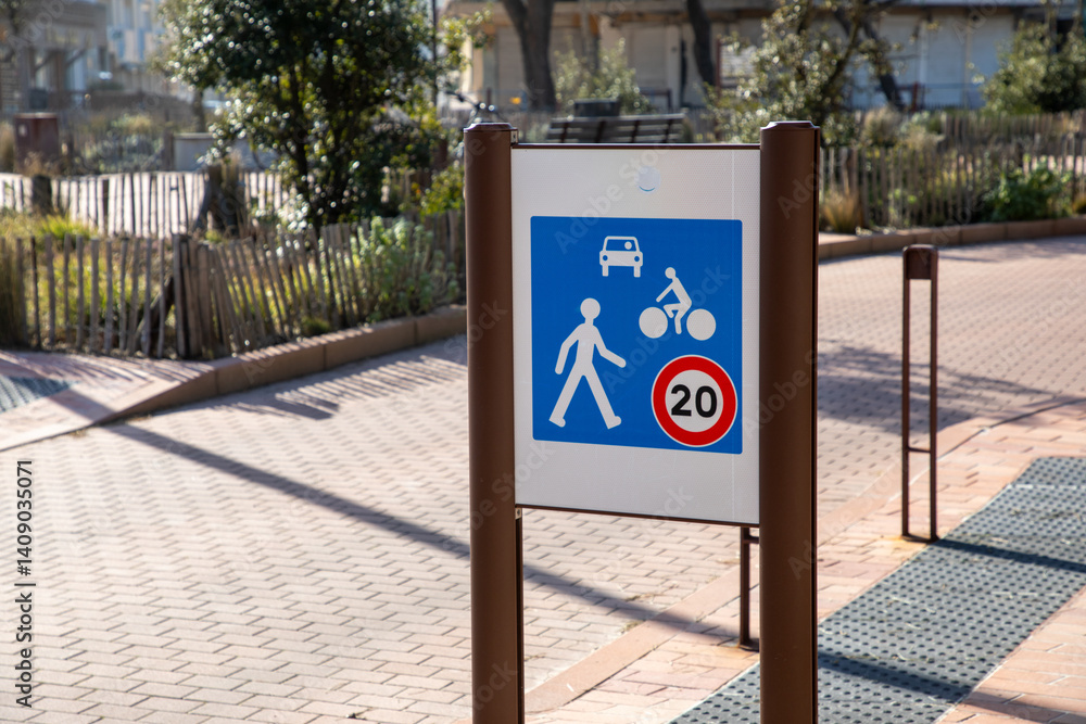 limited speed 20 sign french text road panel signage speed limit for cars bicycles and pedestrians sharing the road