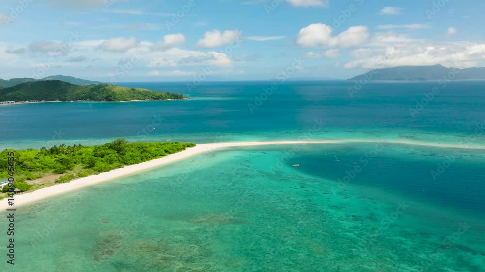 Panoramic view of a tropical sandbar with clear blue water, green islands, and a sunny sky. Bon Bon Beach, Romblon, Philippines. Panoramic view of a tropical sandbar with clear blue water, green islands, and a sunny sky. Bon Bon Beach, Romblon, Philippines.