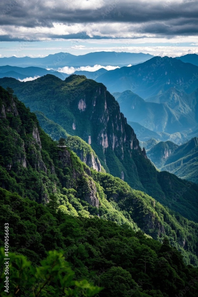Fototapeta premium mountains with a few clouds in the distance and a few trees