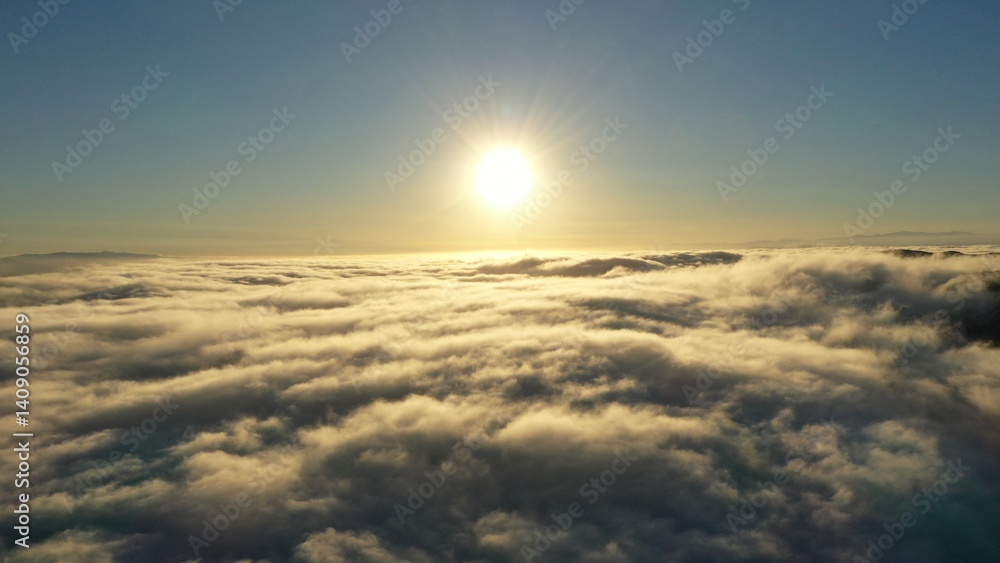 Sunset Skies From Above – Aerial Drone View Over Glowing Clouds Sunset Skies From Above – Aerial Drone View Over Glowing Clouds