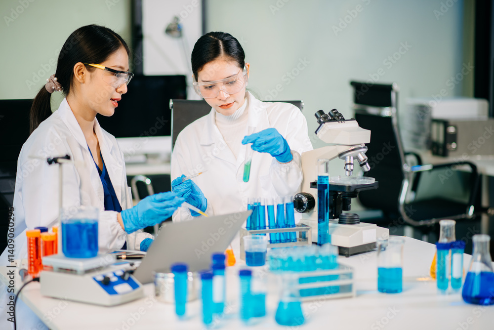 Scientist team meeting and writing analysis results in the laboratory study Scientist team meeting and writing analysis results in the laboratory study