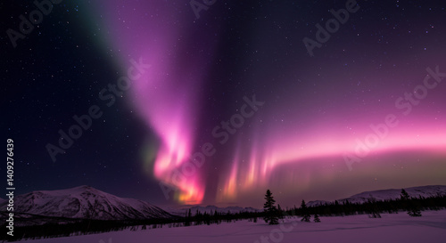 Wallpaper Mural Spectacular aurora borealis lights paint the night sky above snow covered mountains. Torontodigital.ca