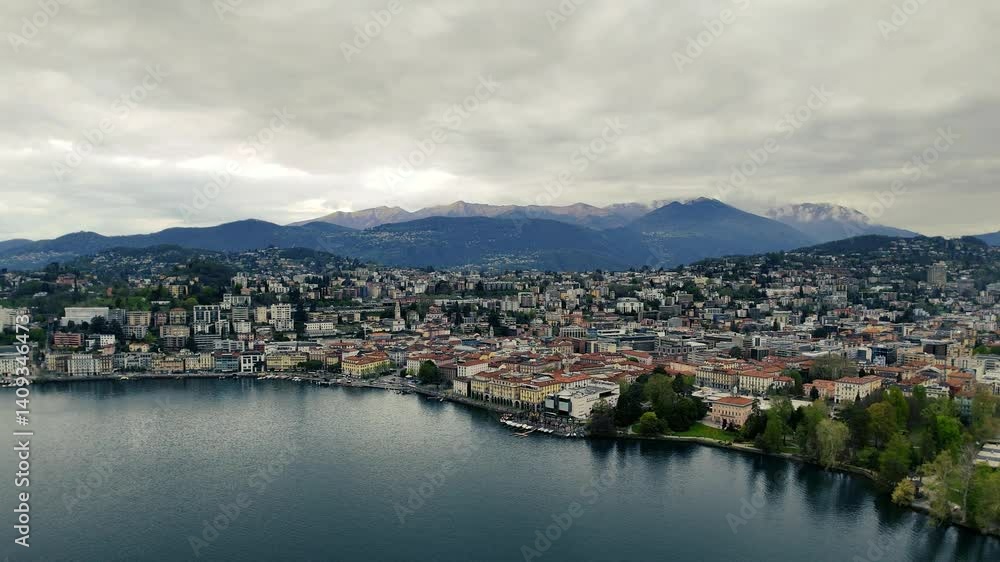 Panoramic view from Lake Lugano overlooking the city of Lugano. Switzerland Panoramic view from Lake Lugano overlooking the city of Lugano. Switzerland