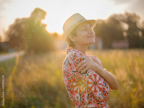 young woman embracing herself, self-love in action, mental health advocate, practicing self-care for finding inner peace, in European countryside