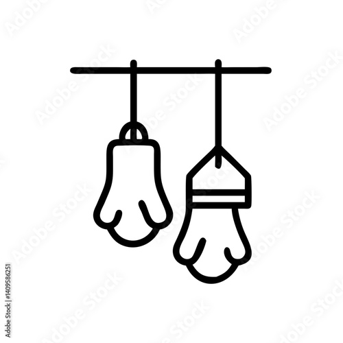 Boxing gloves hanging on a rack in a minimalist style  