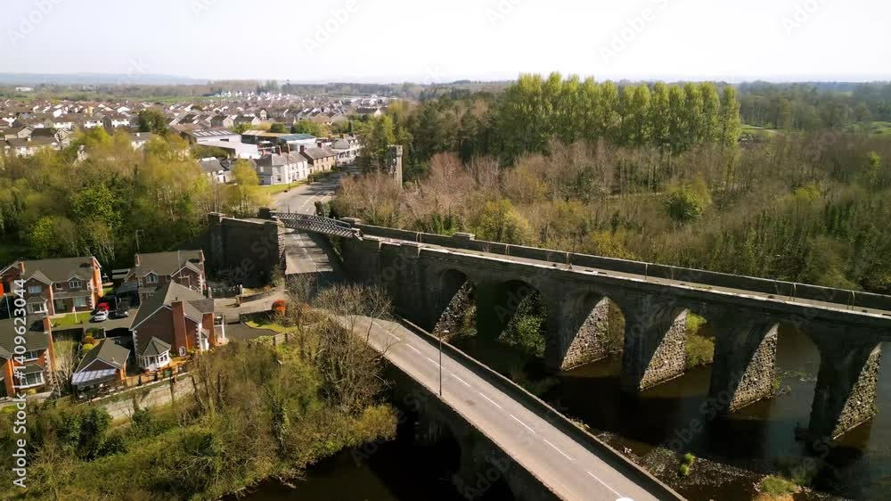 Side-on, forward moving aerial video of Randalstown Viaduct in County Antrim, Northern Ireland, UK. Filmed on a sunny summer's day in 4K, 60 frames per second and in Rec709 Color. Side-on, forward moving aerial video of Randalstown Viaduct in County Antrim, Northern Ireland, UK. Filmed on a sunny summer's day in 4K, 60 frames per second and in Rec709 Color.