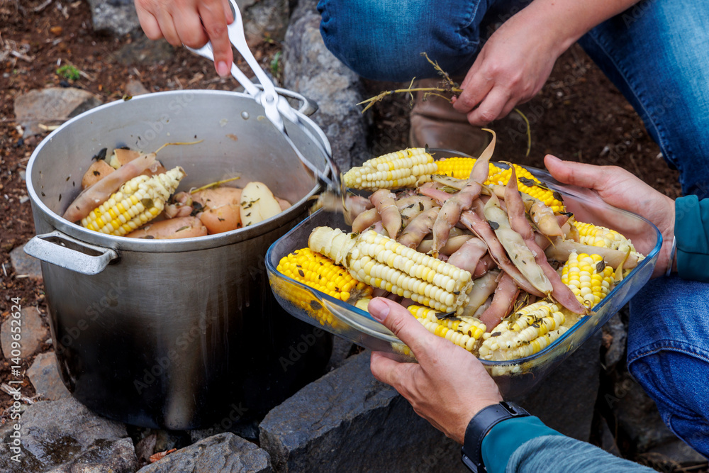 A pot of vegetables cooked on a fire in Camacha mountainous town in municipality of Santa Cruz, Madeira Island, Portugal