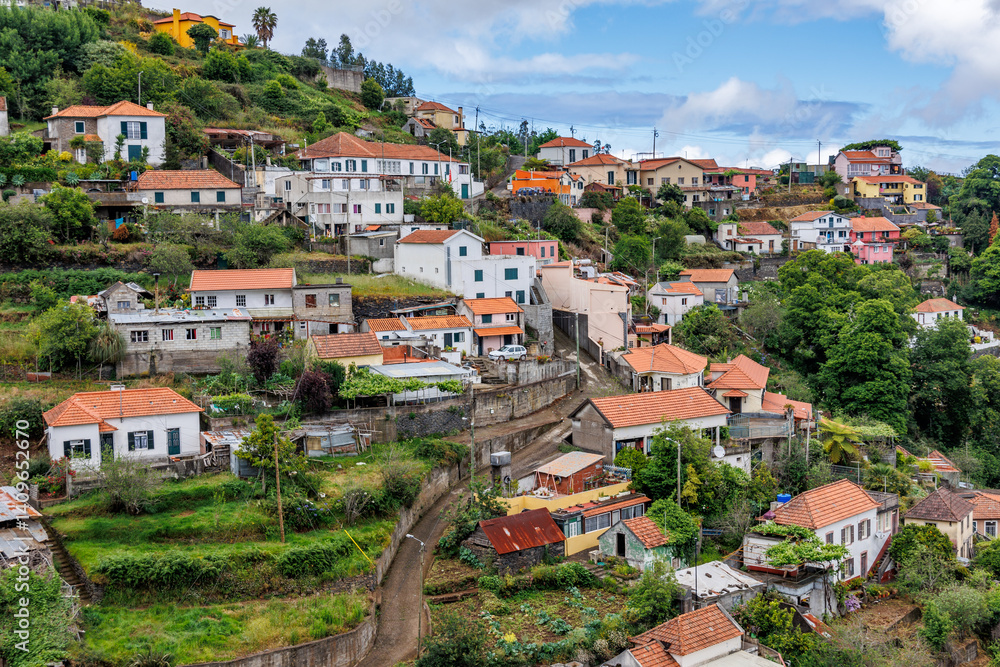 Houses in Camacha mountainous town in municipality of Santa Cruz, Madeira Island, Portugal