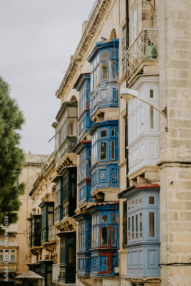 Fototapeta premium Valetta streets with coloured windows in Malta