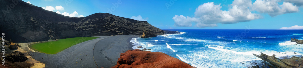 Panoramic view of El Golfo on the island of Lanzarote, Canary Islands. Contrast between the vivid green lagoon (Charco de los Clicos), black volcanic sand, red lava rocks, and the deep blue Ocean