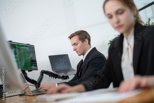 Business professionals collaborating in a modern office space during working hours