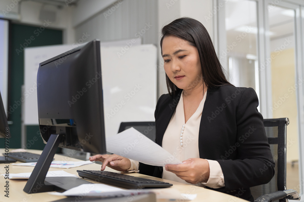 Office, and businesswoman at desk working on computer. businesswoman or entrepreneur working in office. Corporate, employee, and professional worker in corporate workplace Office, and businesswoman at desk working on computer. businesswoman or entrepreneur working in office. Corporate, employee, and professional worker in corporate workplace