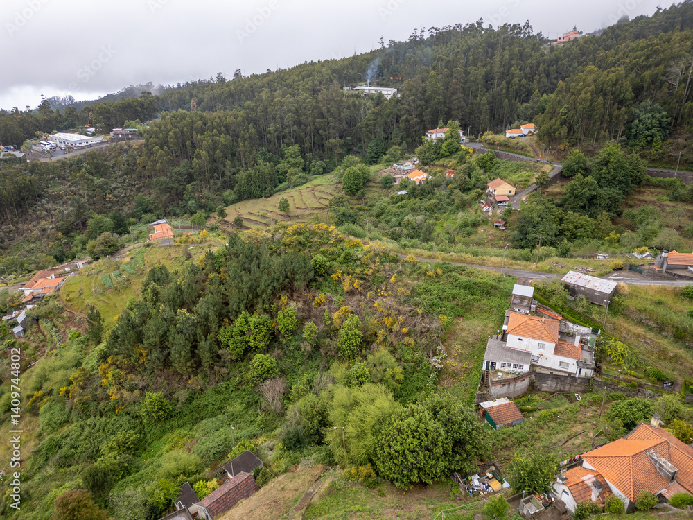 Aerial drone view in Camacha mountainous town in municipality of Santa Cruz, Madeira Island, Portugal