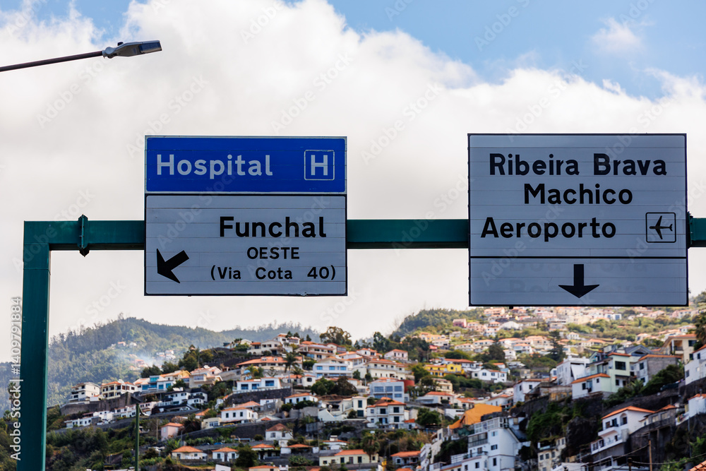 Signs over road near airport on Madeira Island, Portugal