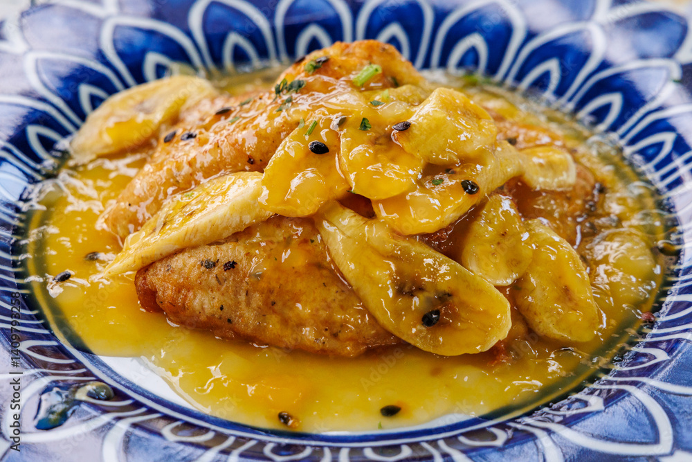 Black scabbardfish with banana and Passion fruit syrup in restaurant on Madeira Island in Portugal