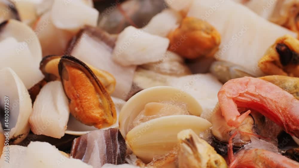 Paella mix, Roasted Mixed Seafood Contain Blue Crabs, Mussels, Big Shrimps, Calamari Squids and Grilled Barracuda Fish Garlic with Spicy Chili Sauce and Lemon on Dish, close up supermarket food. Paella mix, Roasted Mixed Seafood Contain Blue Crabs, Mussels, Big Shrimps, Calamari Squids and Grilled Barracuda Fish Garlic with Spicy Chili Sauce and Lemon on Dish, close up supermarket food.