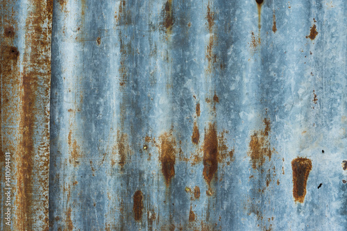 Pattern of rusty corrugated old galvanized sheet.