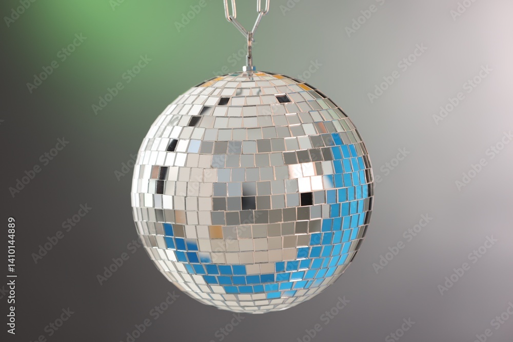 Obraz premium Shiny disco ball on color gradient background