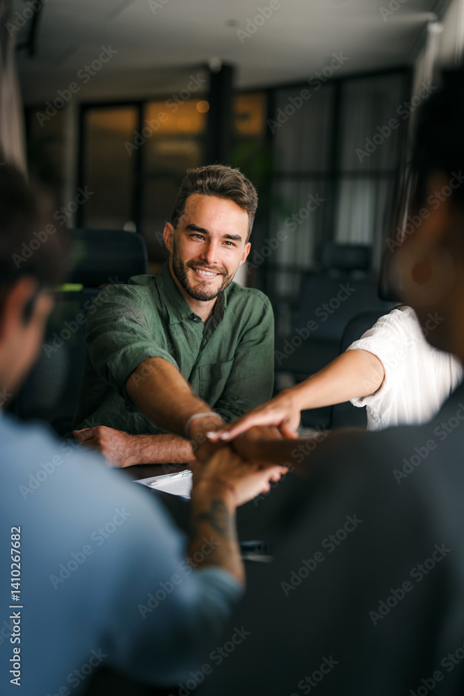 Diverse group of business people's hands showing unity and teamwork. Diverse hands for teamwork