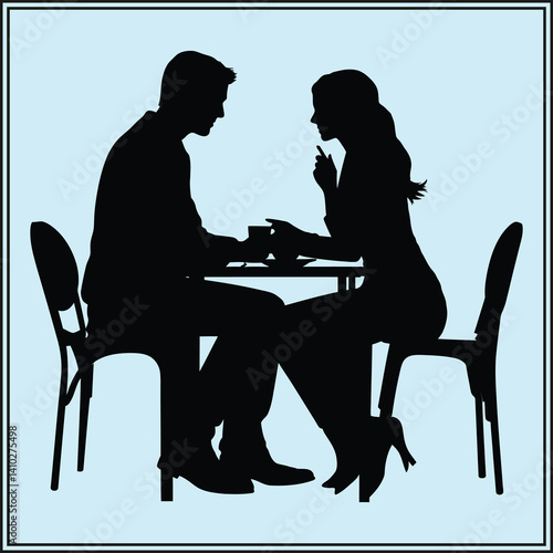 silhouette of a couple sitting in a cafe
