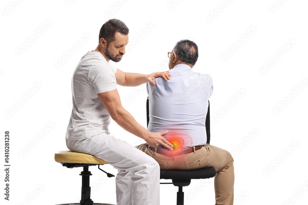 Massage therapist treating a man with lower backpain Massage therapist treating a man with lower backpain