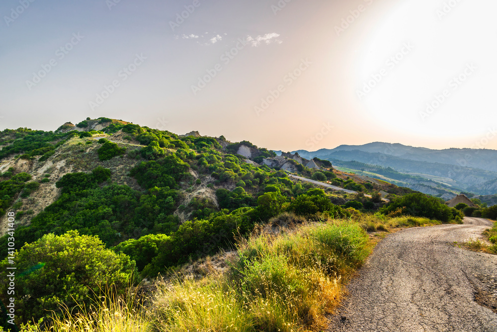 Fototapeta premium rural countryside landscape inside the badlands national Park during a sunny summer day, Val d'Agri, Basilicata