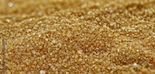 An awe-inspiring close-up view of sand grains magnified under a microscope, revealing an intricate tapestry of delicate textures and patterns.