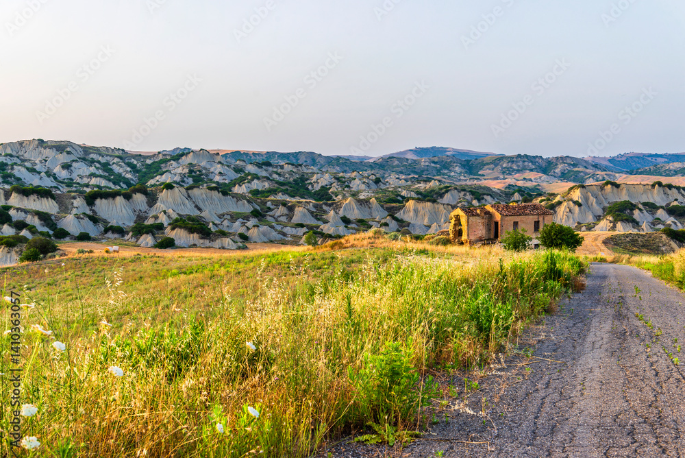 Obraz premium rural countryside landscape inside the badlands national Park during a sunny summer day, Val d'Agri, Basilicata