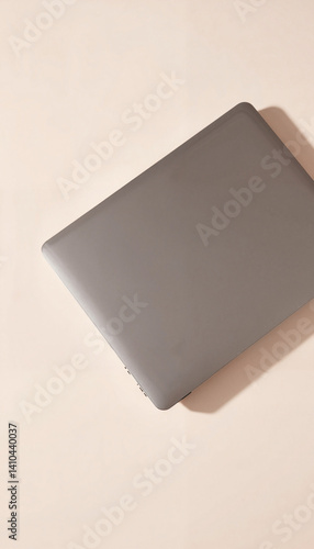 Premium closed laptop mockup on neutral background, modern design