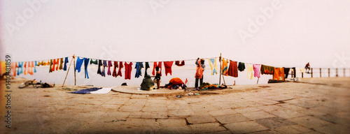 Panoramic image of hanging clothes out to dry after washing them in the river, Ganges River, Varanasi, Uttar Pradesh, India.