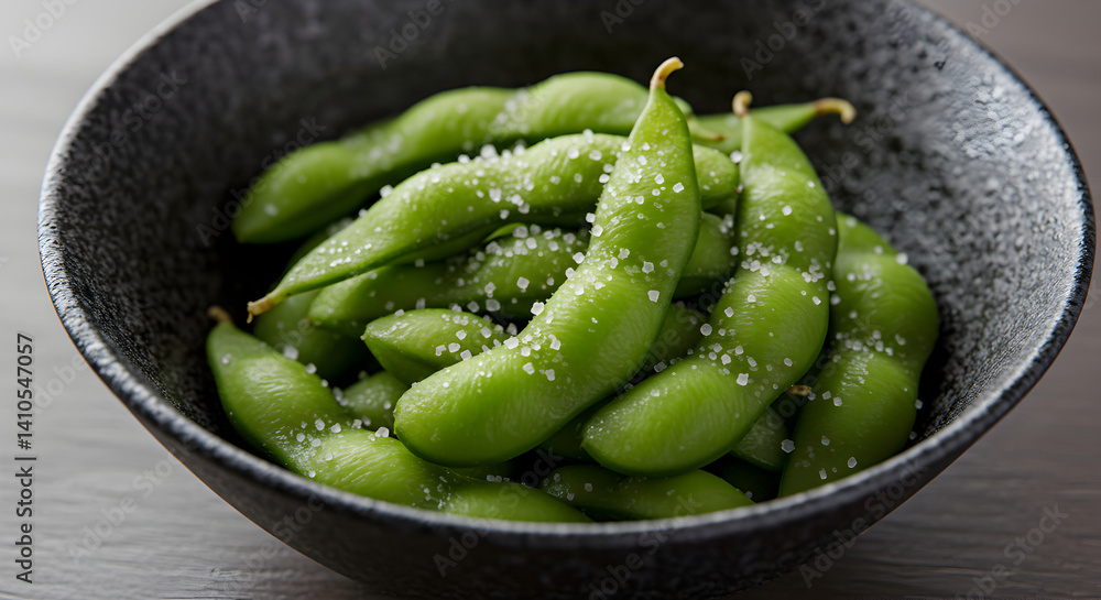 Edamame Appetizer Sprinkled With Sea Salt Presented in a Dark Bowl Edamame Appetizer Sprinkled With Sea Salt Presented in a Dark Bowl