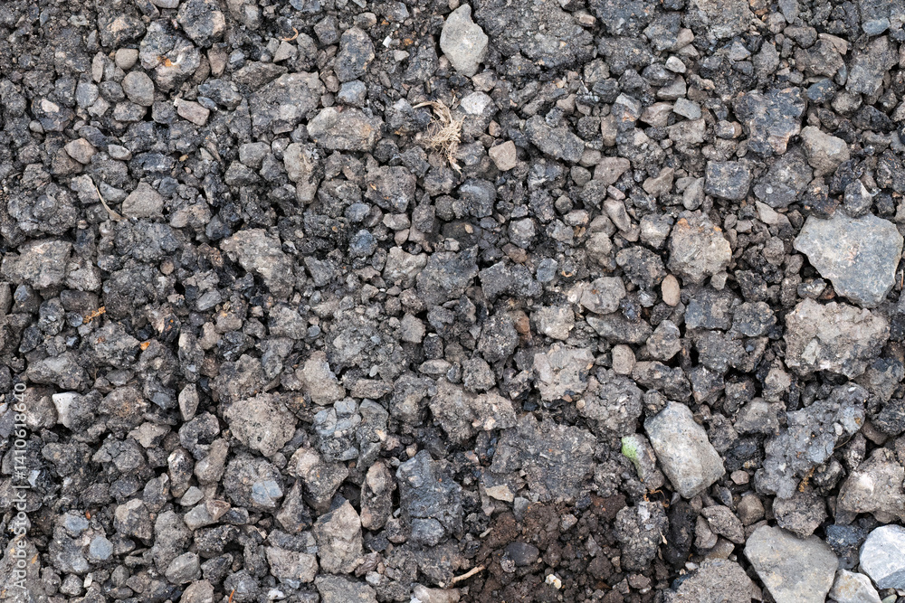 Close-up of rough asphalt rubble surface
Close-up of rough asphalt rubble surface