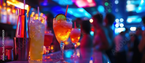 Colorful Drinks and People Enjoying Nightlife in a Lit Up Bar