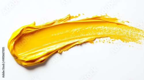 Vibrant yellow paint brushstroke on white background