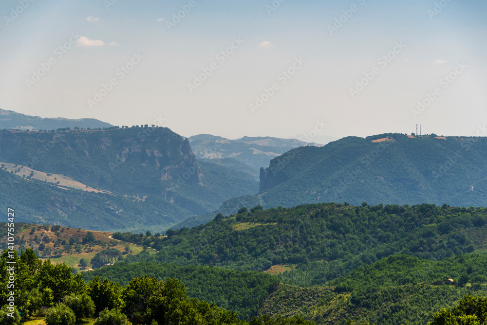 Obraz premium rural countryside landscape during a sunny summer day inside Val d'Agri, Basilicata