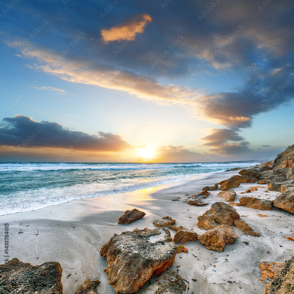 Unbelivable view of sunset on beach Capo San Marco Oristano on Del Sinis peninsula.