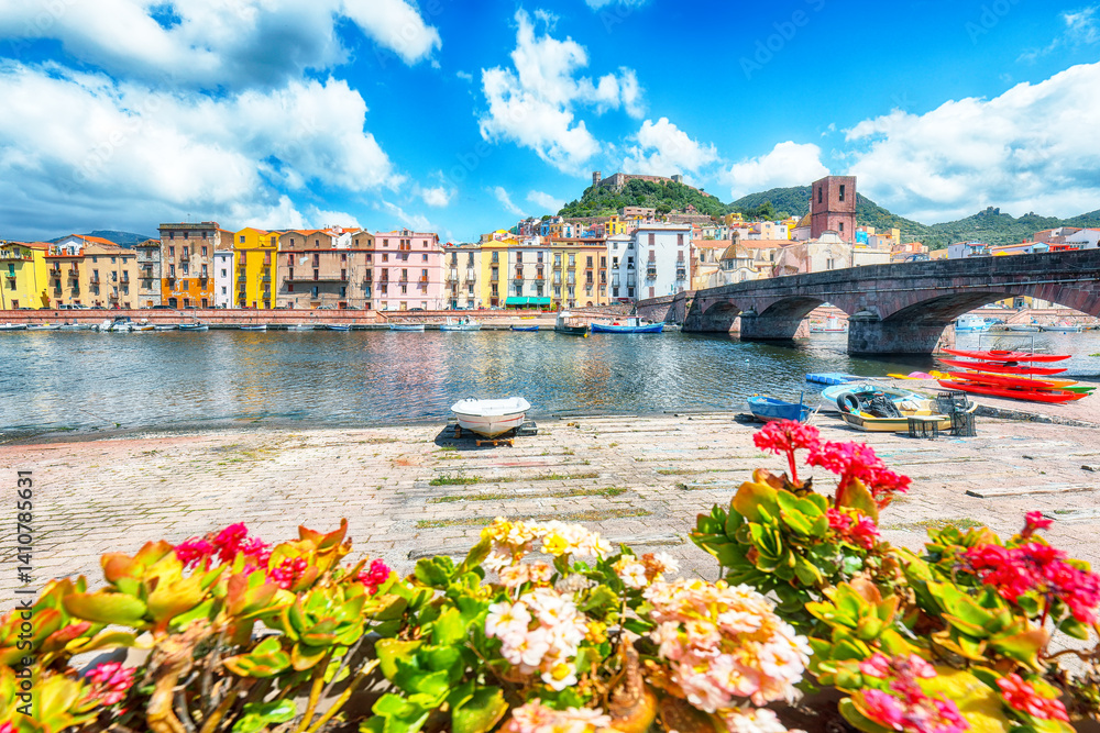 Attractive cityscape of Bosa town with Ponte Vecchio bridge across the Temo river.
