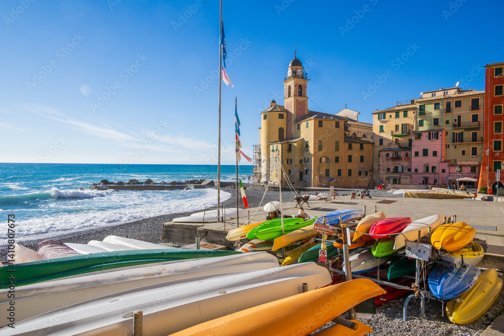Obraz premium The village of Camogli is a fishing village and tourist resort located on the west side of the peninsula of Portofino, on the Golfo Paradiso Riviera di Levante, Italy