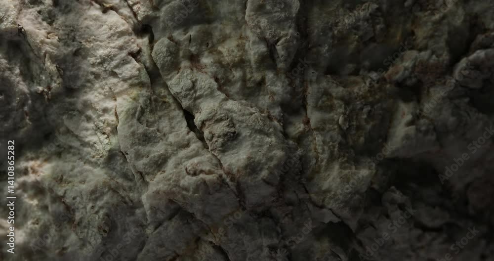 Textured Rock Surface with Interplay of Light and Shadow Textured Rock Surface with Interplay of Light and Shadow