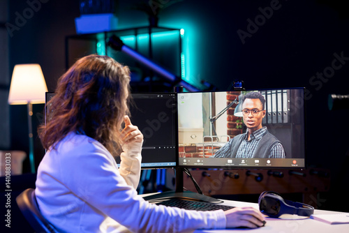 Computer science teacher doing online tutoring, telling student in online videocall about ways to fix computing bugs. IT professional teaching disciple in webinar how to do programming