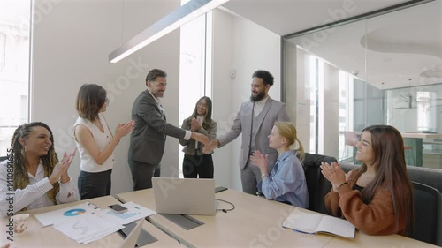 A skilled team celebrates their success in closing a significant business deal in a sleek conference room, highlighting the importance of teamwork and collaboration throughout the process