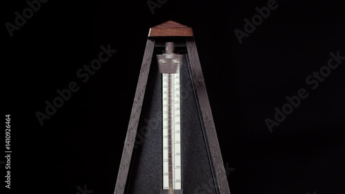 Metronome clicking on a table