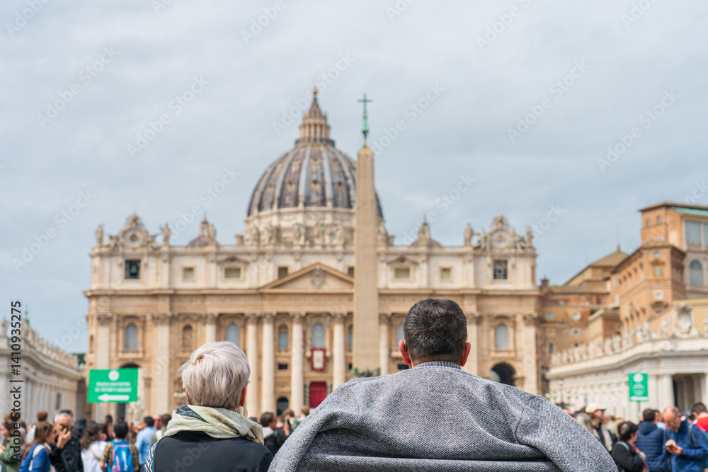 Tourists couple visit Vatican city and St. Peter's Basilica church in Rome. Italy