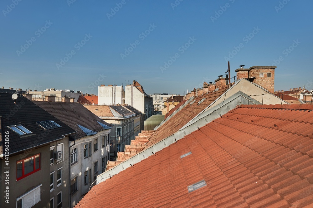 Tiled Building Roofs Over a City Street