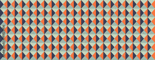 Abstract geometric seamless pattern.  Vibrant teal, orange, and navy triangles create a dynamic, midcentury modern design. Ideal for website backgrounds, textile prints, or packaging.