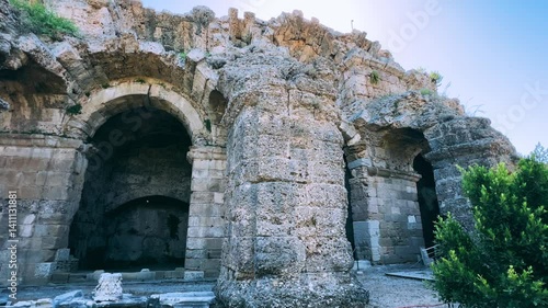 Wallpaper Mural SIDE, TURKEY, June 16, 2024: Ruins of the ancient city of Side in Antalya province on the Mediterranean coast. Amazing ruins of an ancient city. Old statues in the State Agora.The ancient city wall.4K Torontodigital.ca