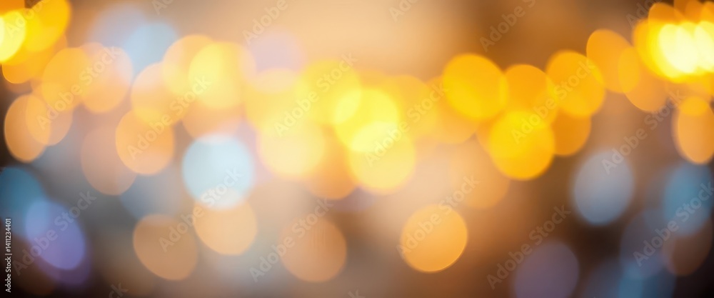 Obraz premium Abstract blurred yellow lights, creating soft, dreamy bokeh effect, night, city