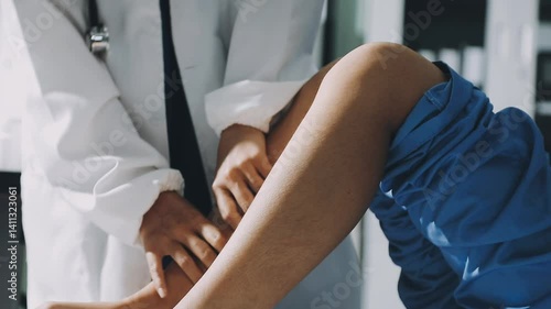Emergency room nurse examining injured teen girl patient